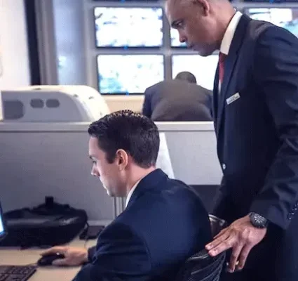 Professionals reviewing security plans for Texas corporate events